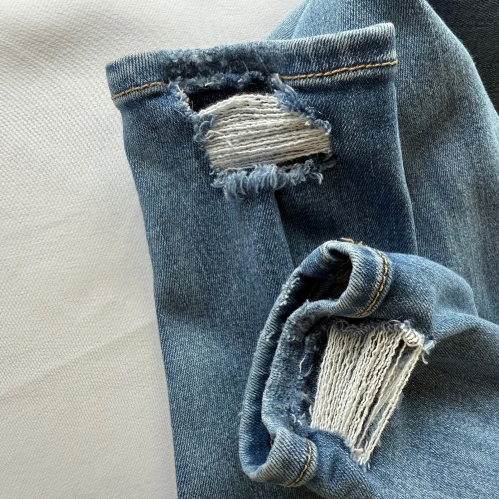 American Eagle Super Hi-Rise Jegging Distressed Blue Jeans Next Level Stretch 0
